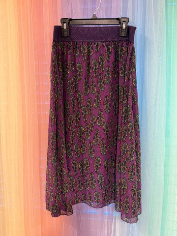 LuLaRoe brand label and size S label inside purple waistband