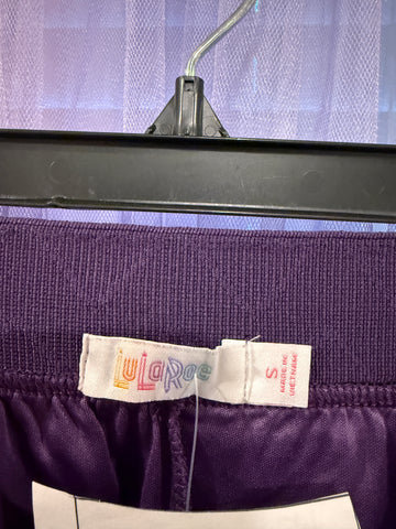 LuLaRoe purple long skirt with multicolored feather motifs and wide zigzag-stitched waistband