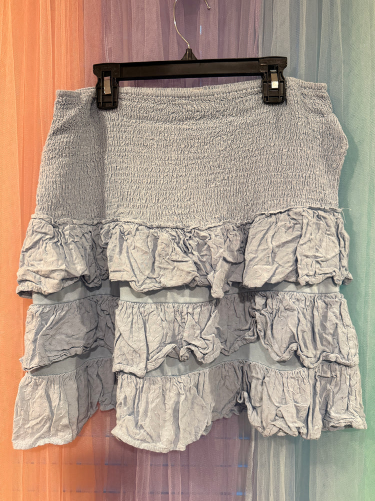 L Love pale blue skirt with wide smocked upper section and three ruffled tiers