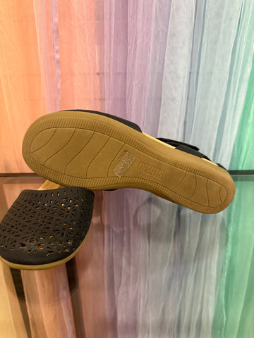 RIHERO flats showing tan outsole and decorative toe cutouts