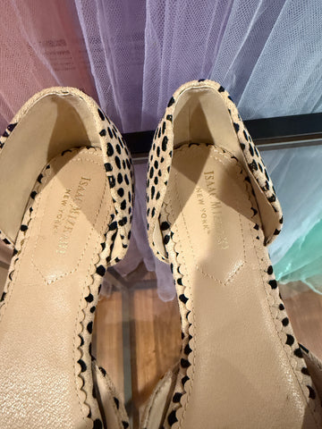 Interior of spotted flats showing Isaac Mizrahi New York labels