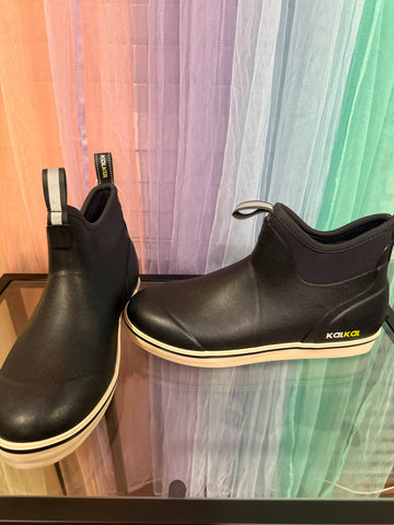 Black KALKAL pull-on ankle boots with light-colored soles