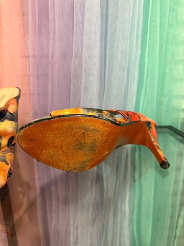 Outsole of floral mule heel showing visible pre-loved wear