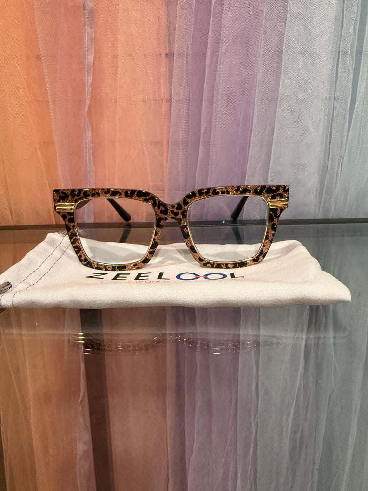 Front view of ZEELOOL leopard-print square prescription eyeglasses with gold-tone accents