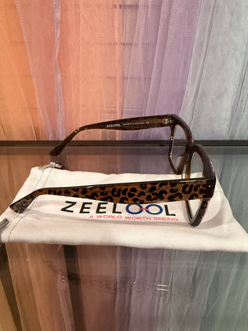 Side view showing leopard-print arms and ZEELOOL inner-arm branding
