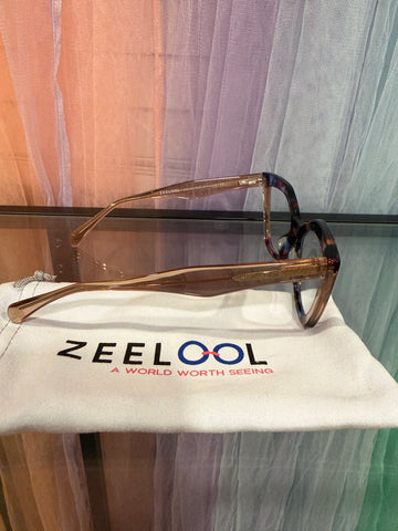 Side view of ZEELOOL eyeglasses with translucent brown arms