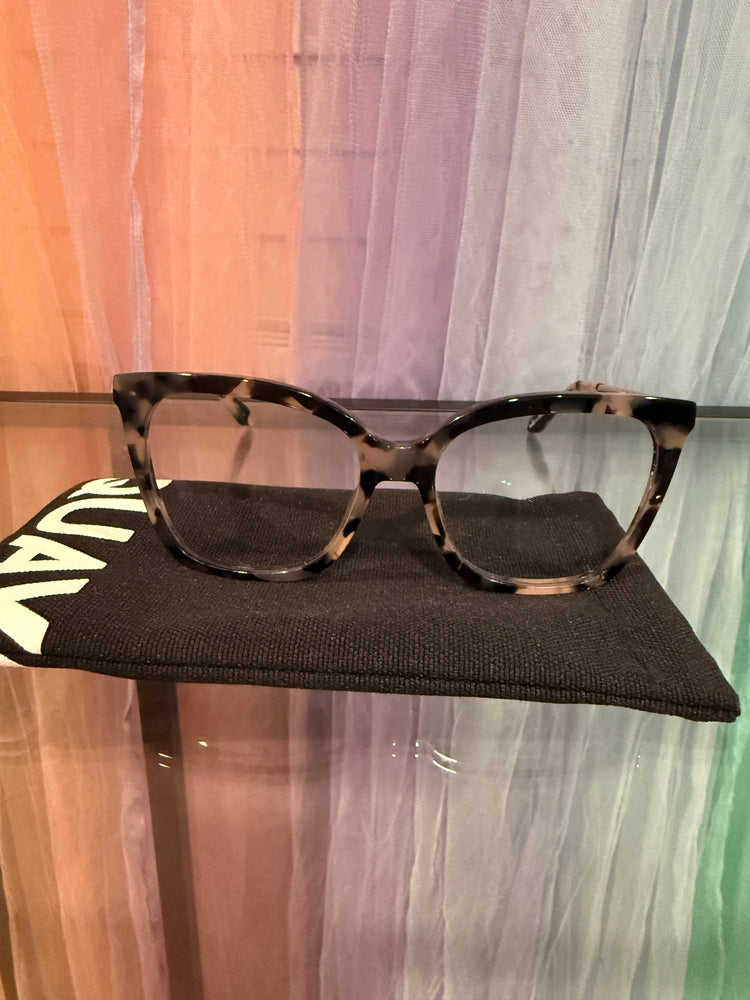 Front view of dark and pale neutral tortoiseshell cat-eye prescription eyeglasses