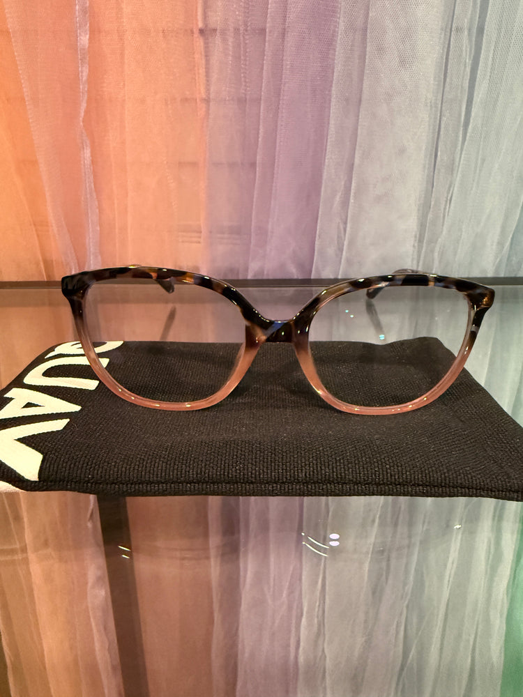 Front view of tortoiseshell and translucent blush cat-eye prescription eyeglasses