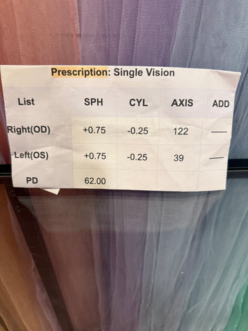 Supplied single-vision prescription card showing lens values and PD