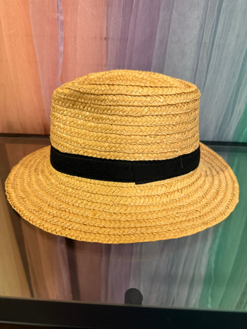 Side view of natural-tone woven fedora and black band